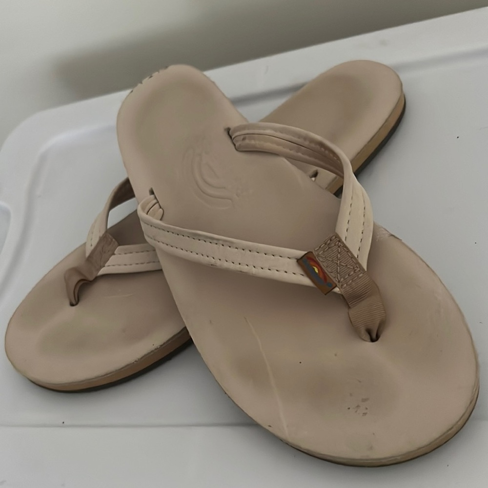 Rainbow flip flops worn once